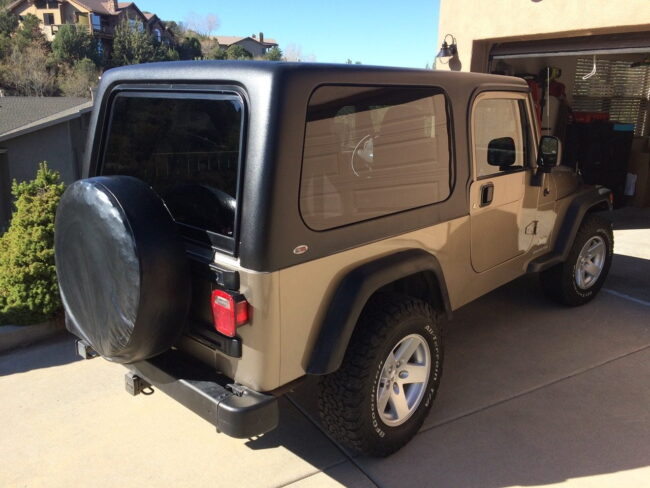 high-quality fiberglass hardtop High-quality fiberglass hardtop installed on a sport truck